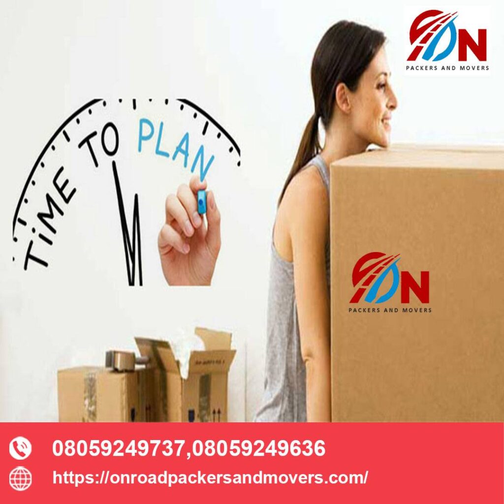 a girl shifting box for her packers and movers in bangalore task whiche she had planned